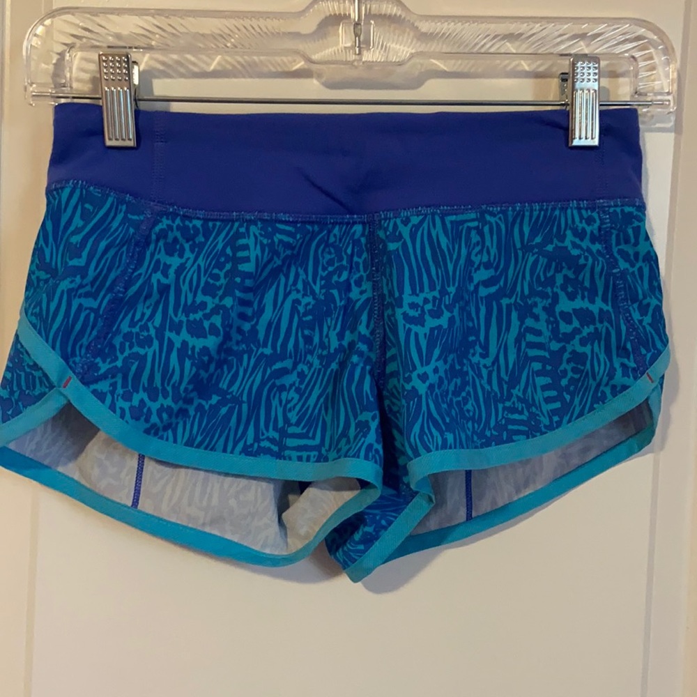 Athletic shorts with adjustable waist